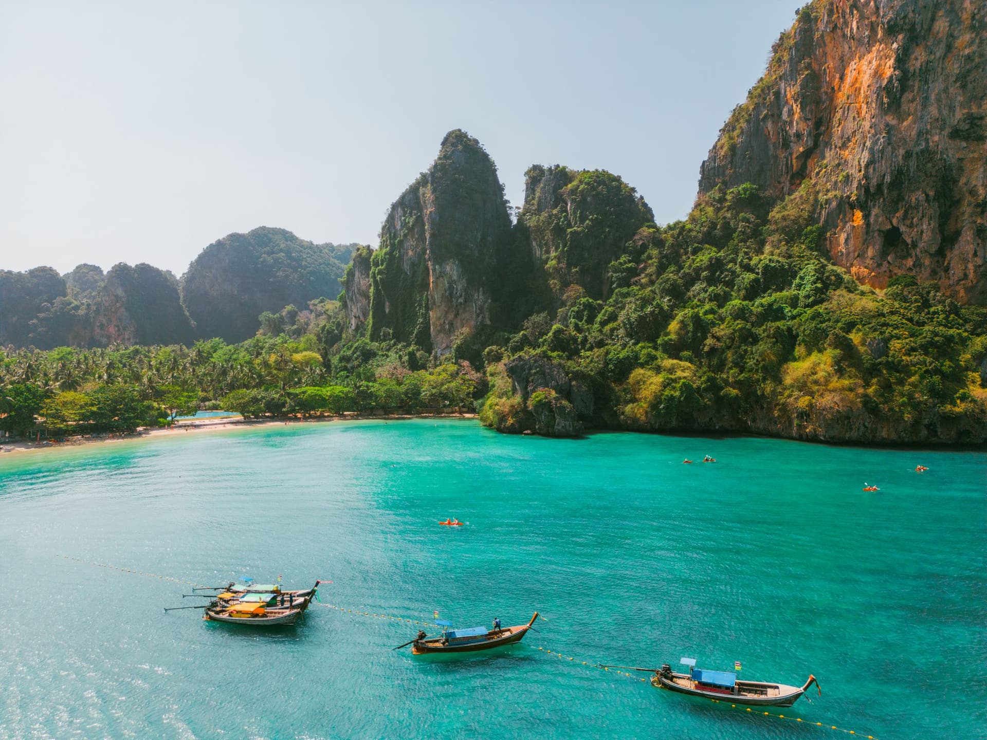 Aerial view of sea kayaking near idyllic beach